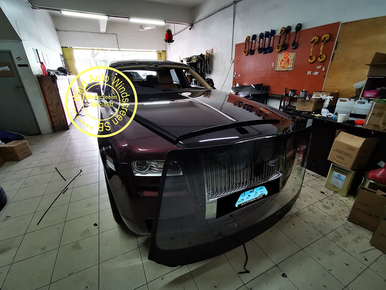 Large windshield replacement in progress